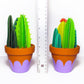 Cute bunch of green 3D paper cacti in terracotta pots with ruler showing height of about 6.5" inches.