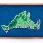 Framed original cut paper topographical map of Martha's Vineyard Island against beautiful blue Japanese paper background. 