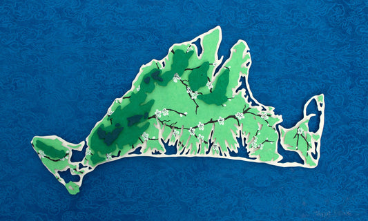 Framed original cut paper topographical map of Martha's Vineyard Island against beautiful blue Japanese paper background.