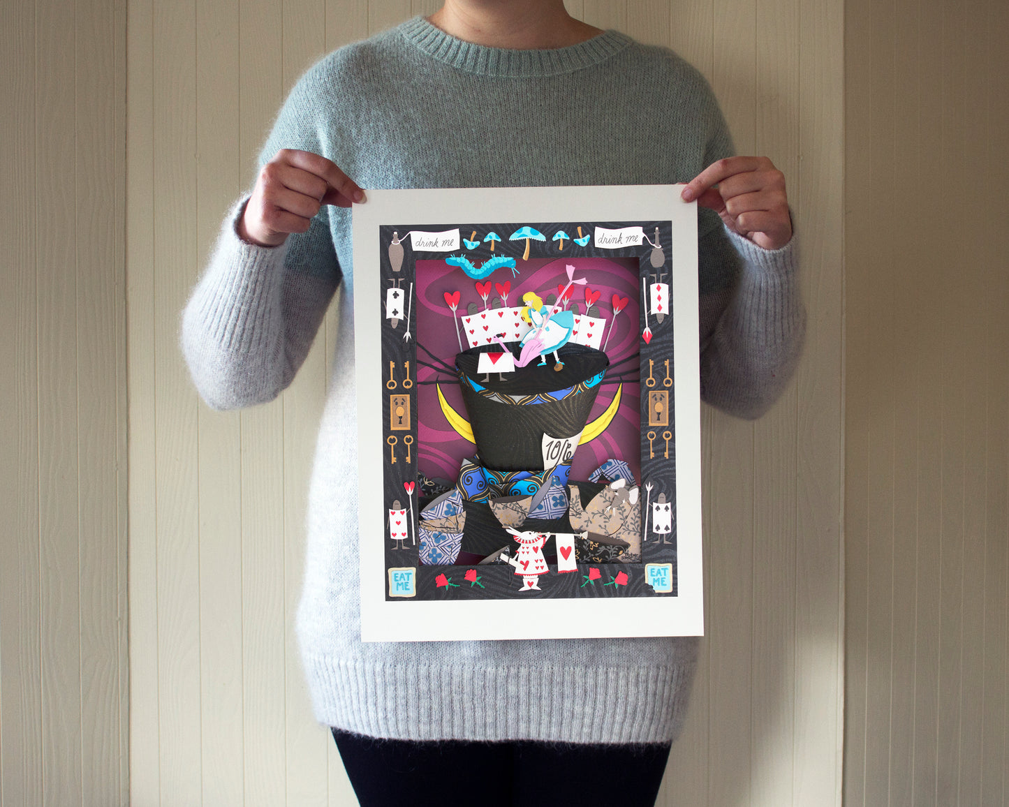 Original cut paper illustration inspired by Alice in Wonderland, showing the scale of the print (13x10").