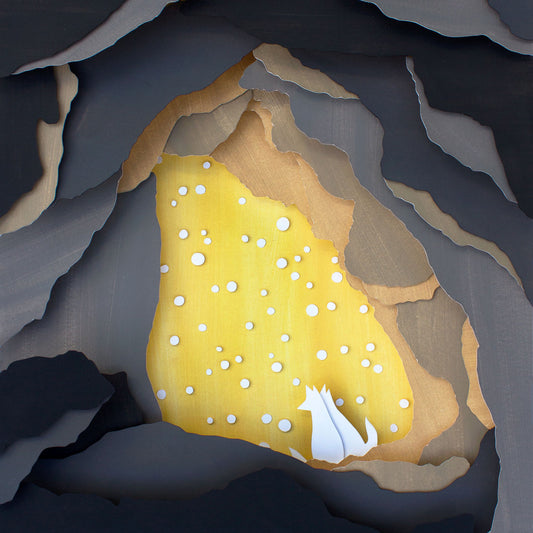 Archival print of cut paper illustration of cute scene with two foxes cuddling in a backlit snowy cave.