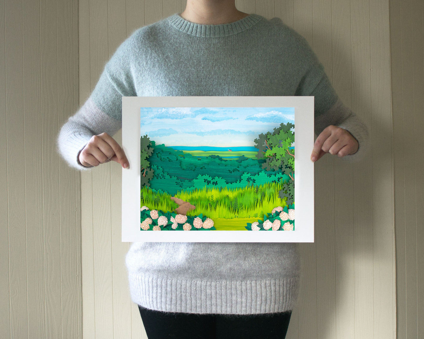 Archival print of cut paper illustration of landscape scene of South Beach on Martha's Vineyard, with pink hydrangea flowers.