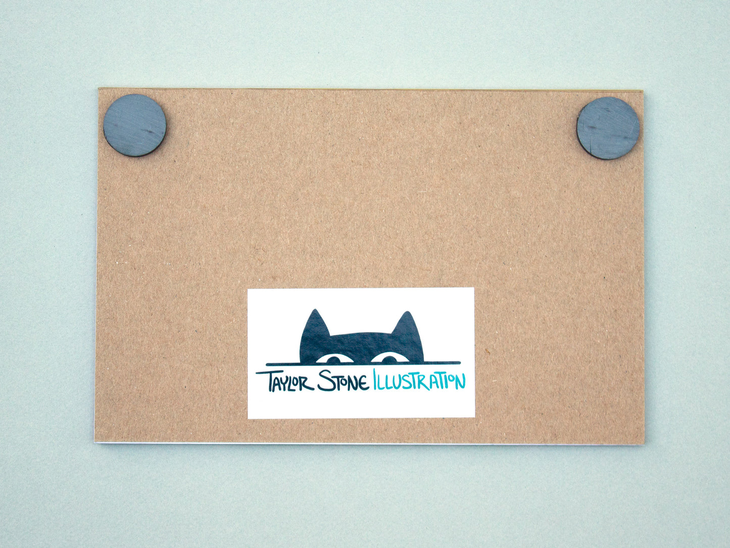 Back of notepad with magnet and Taylor Stone Illustration cat logo.