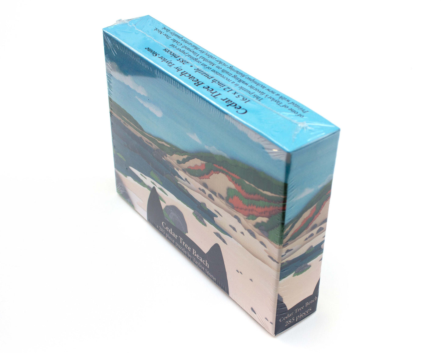 Cute jigsaw puzzle of cut paper illustration of cedar Tree Neck beach on Martha's Vineyard.