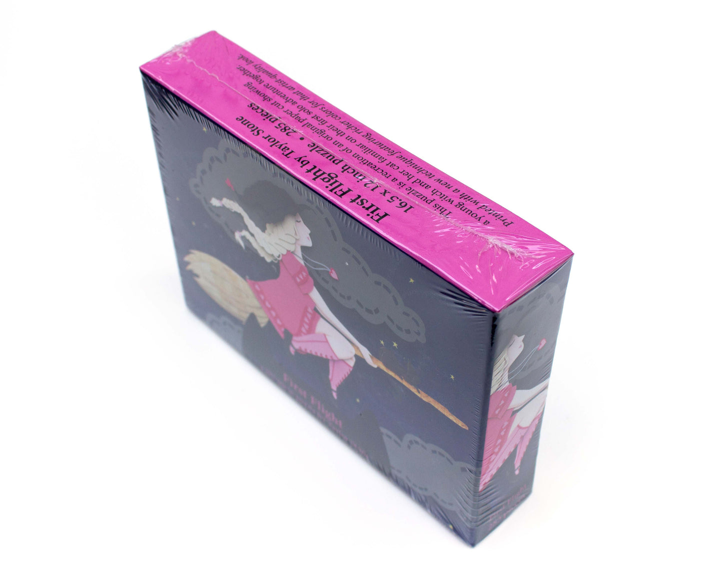 Cute jigsaw puzzle of cut paper illustration of witch flying on a broom at night with a black cat.