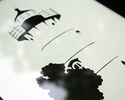 Framed simple black and white cut paper illustration of the East Chop Light House in Oak Buffs, Martha's Vineyard.