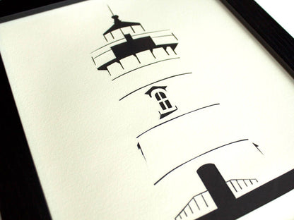Framed simple black and white cut paper illustration of the Edgartown Light House on Martha's Vineyard