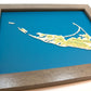 Framed original cut paper topographical map of Nantucket Island.