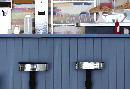 Archival print of cut paper illustration of the inside of the ArtCliff Diner on Martha's Vineyard, showing details of the bar stools and counter.