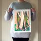 Archival print of cut paper illustration of cute whimsical forrest scene with two foragers featured at the bottom.