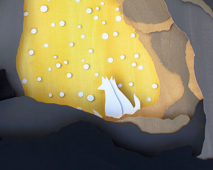 Archival print of cut paper illustration of cute scene with two foxes cuddling in a backlit snowy cave.