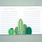 Cute notepad with cut paper illustration of cactus at the bottom.